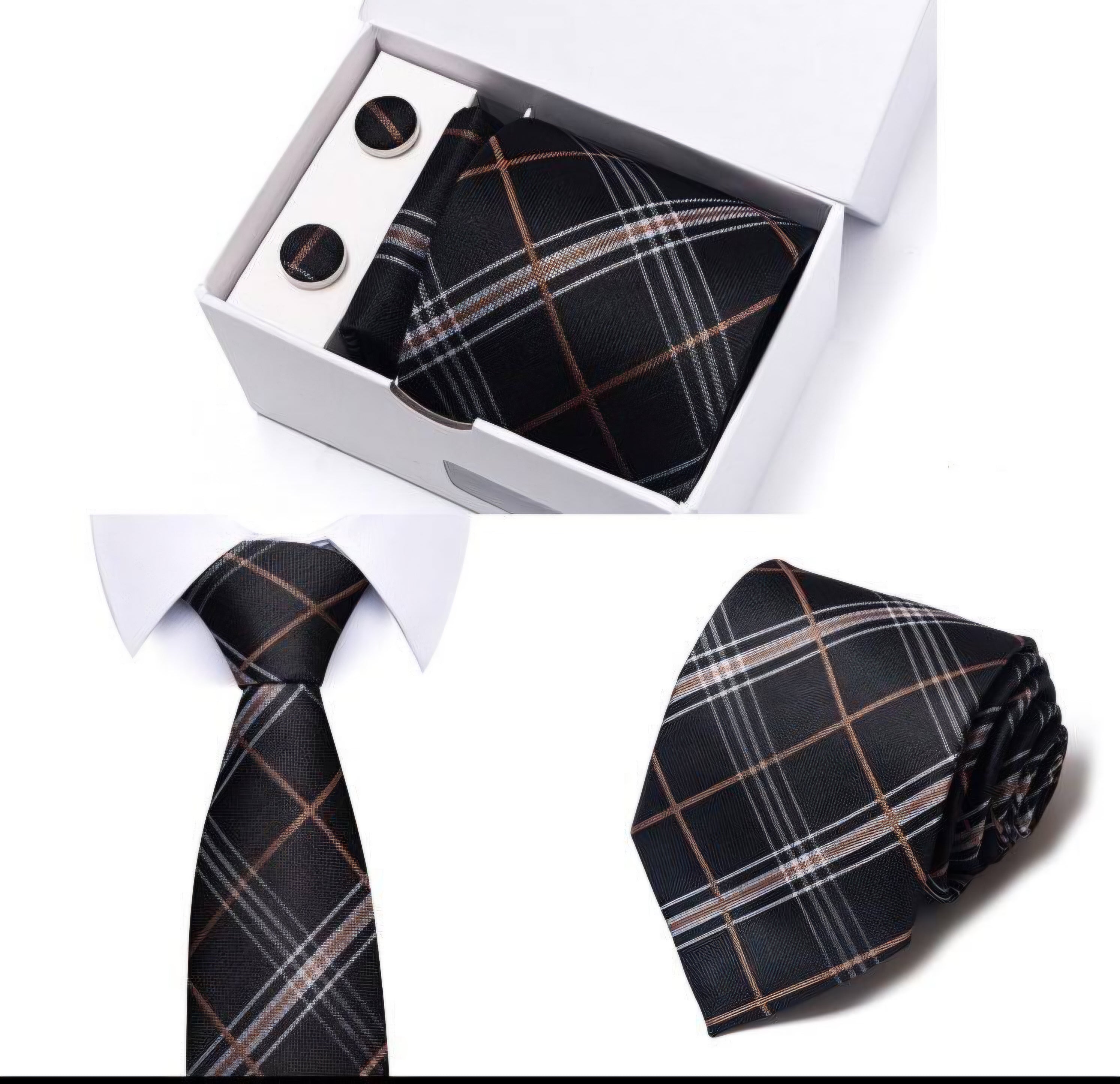 Black tie set with pocket square and cufflinks in a box on a white background