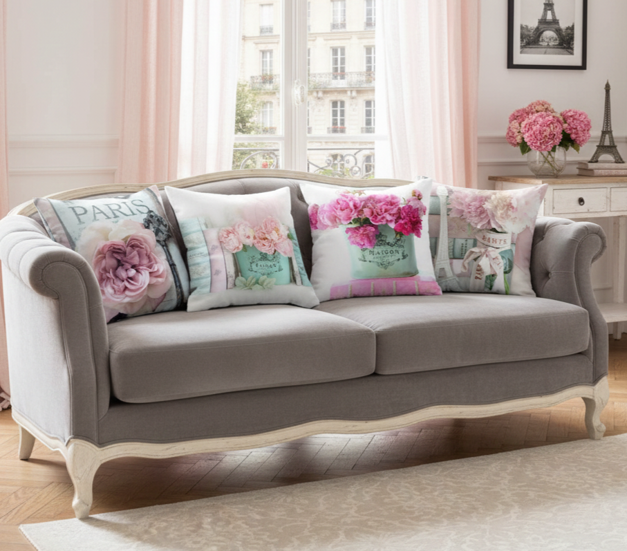 Gray sofa with decorative pillows in a living room setting