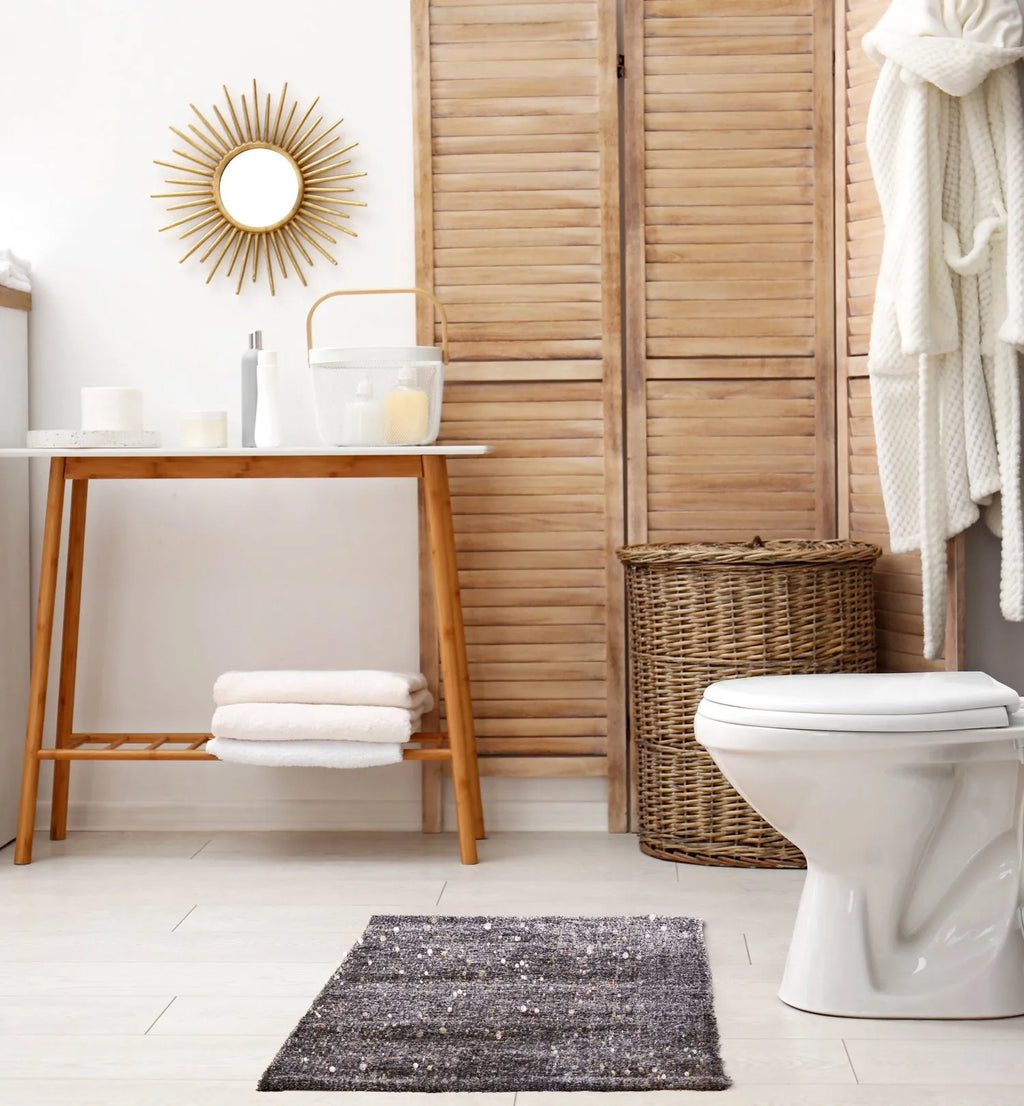 Sparkles Small Grey Rug in a bathroom setting