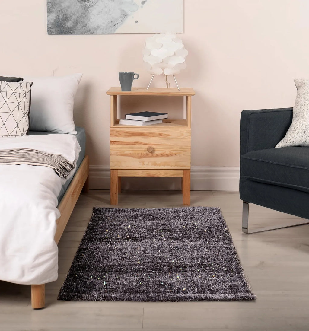 Sparkles Small Grey Rug in a bedroom