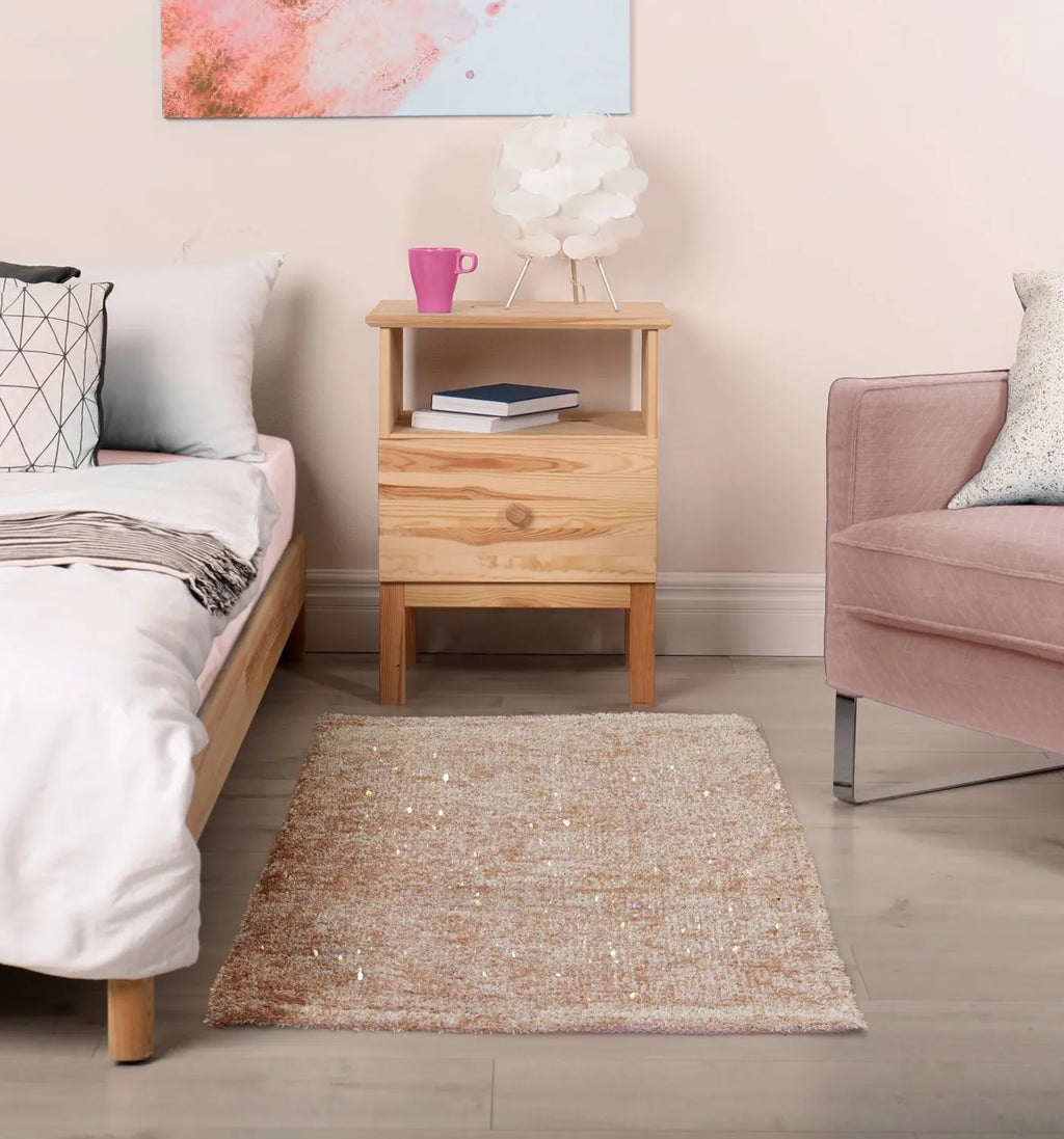 Sparkles Small Pink Rug in a bedroom setting
